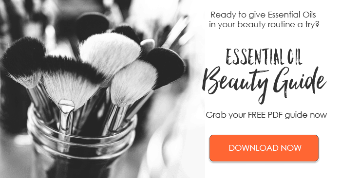 black and white photo of makeup brushes with text for Essential oil beauty guide