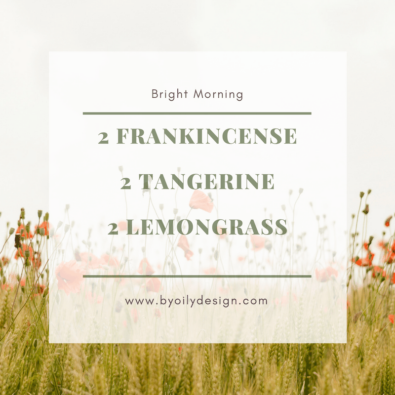 Frankincense DIffuser Blend called Bright morning laid in text over orange flowers and grass