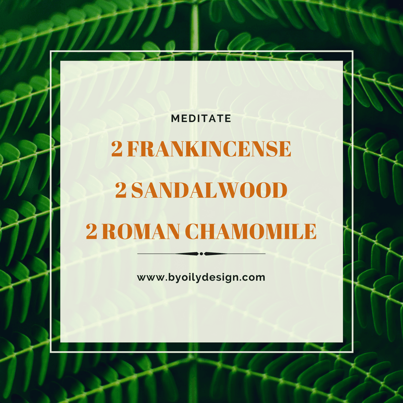 Frankincense DIffuser Blends in text laid over green leaves