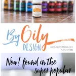 Bottle of Citrus Fresh Essential oil with other premium starter kit oils and a diffuser.