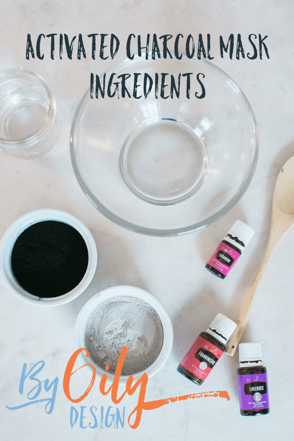 Glass jar with Charcoal, clay, essential oils, glass bowls and wooden spoon.