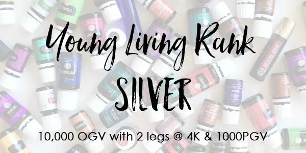 Text over lay of essential oil bottles- Young Living Rank of Silver 10,000 OGV with 2- 4K legs & 1000pgv