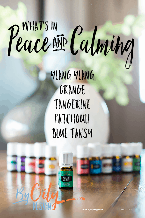 bottle of peace and calming essential oil with 11 other young living essential oils and a desert mist diffuser behind the oils. All are on a wooden table by a window with a plant. Text overlay shares the ingredients for peace and calming oil- Ylang Ylang, Orange, Tangerine, Patchouli and Blue Tansy