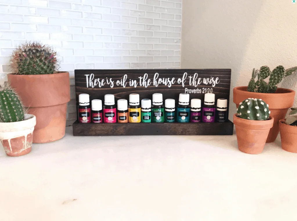 small essential oil shelf with bible verse