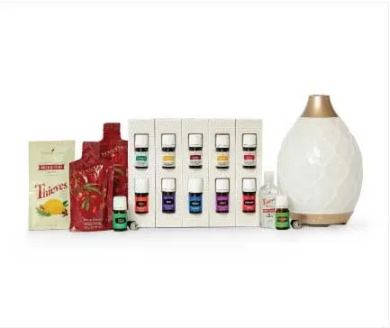 Young Living Premium Starter kit with 12 oils diffuser, Ninxgia Red juice, Thieves hand sanitizer and Thieves Cleaner.