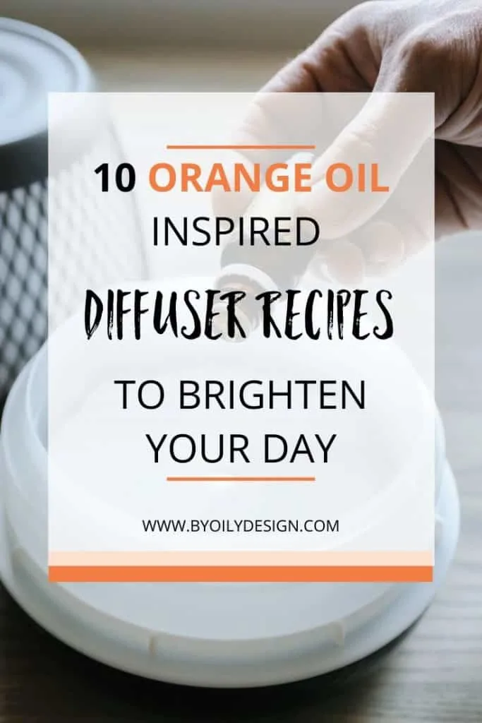 someone placing drops of orange essential oil into a diffuser.