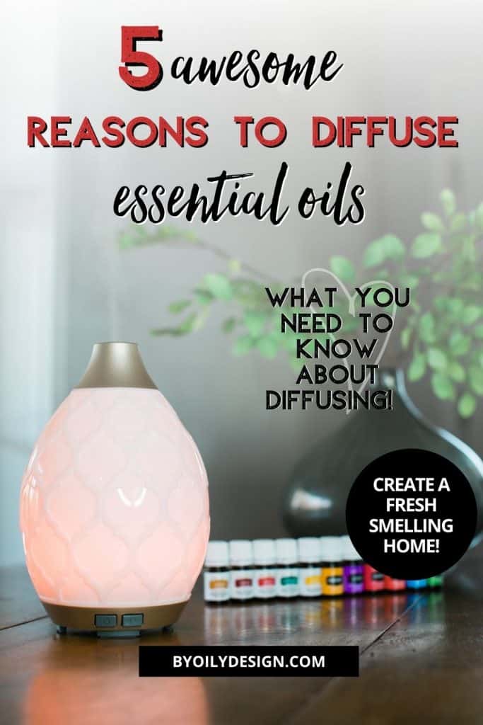 row of oils next to an essential oil diffuser. oil in diffuser is diffusing.