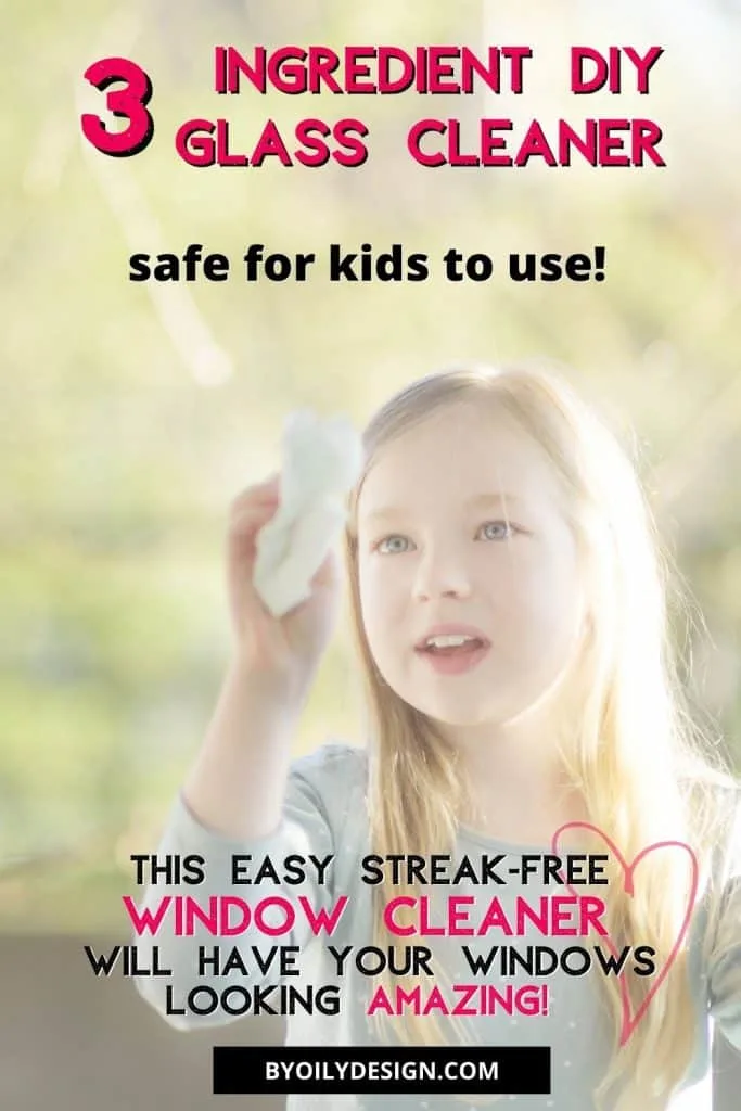 Young girl using homemade glass cleaner